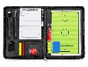 Open football coaching folio with tactics board.webp