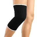 Black knee sleeve on bent leg.webp